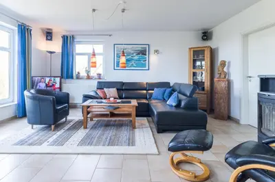 Ein Sitzbereich in der Unterkunft Ferienhaus Am Felde