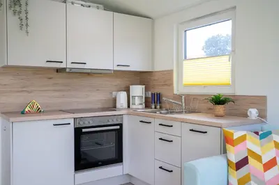 Küche/Küchenzeile in der Unterkunft Ostseecamp Ferienhaus 
