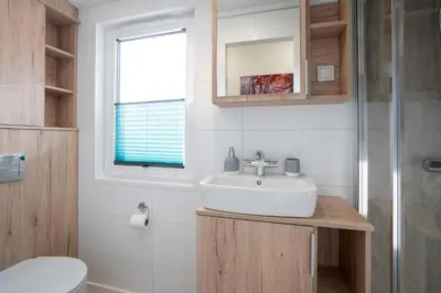 Ein Badezimmer in der Unterkunft Ostseecamp Ferienhaus 