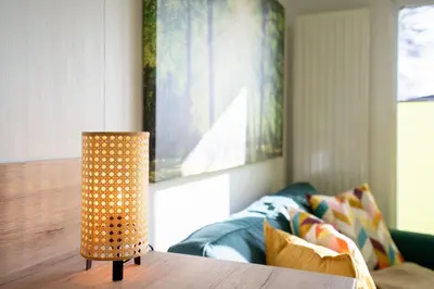 Ein Bett oder Betten in einem Zimmer der Unterkunft Ostseecamp Ferienhaus 