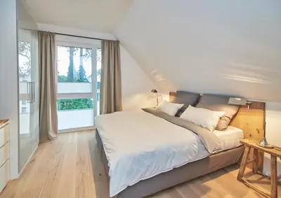 Ein Bett oder Betten in einem Zimmer der Unterkunft Sunshine Suite - mit Meerblick