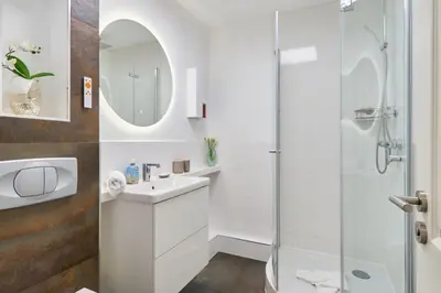 Ein Badezimmer in der Unterkunft Höppnerweg 5 Seemöwe 18
