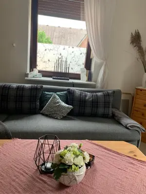 Ein Sitzbereich in der Unterkunft Zwei Zimmer Natur und Luxus Ferienwohnung mit Garten