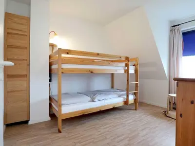 Ein Bett oder Betten in einem Zimmer der Unterkunft Altes Zollhaus, Fewo- Nr 5