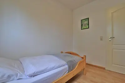 Ein Bett oder Betten in einem Zimmer der Unterkunft Barendorf Whg Meyer1