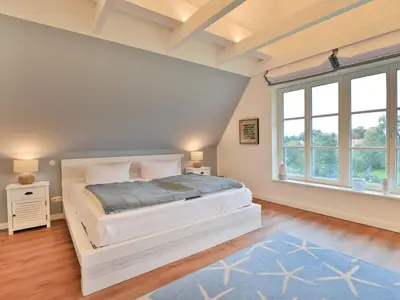 Ein Bett oder Betten in einem Zimmer der Unterkunft Barkley Reethaus