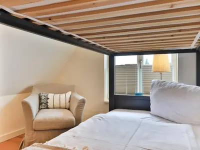 Ein Bett oder Betten in einem Zimmer der Unterkunft Barkley Reethaus