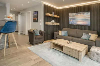 Ein Sitzbereich in der Unterkunft Beach House Penthousewohnung Leuchtturm