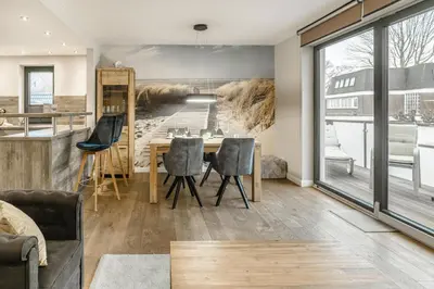 Ein Sitzbereich in der Unterkunft Beach House Strandblick