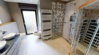 Ein Badezimmer in der Unterkunft Heaven House Meeresbrise mit Whirlpool