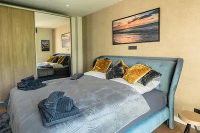 Ein Bett oder Betten in einem Zimmer der Unterkunft Heaven House Family