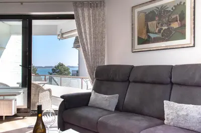 Ein Sitzbereich in der Unterkunft Ferienwohnung Kaiserallee Travemünde