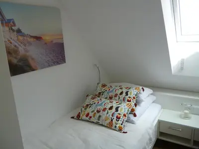Ein Bett oder Betten in einem Zimmer der Unterkunft Ostsee-Wellnesslandhaus mit Sauna, Jacuzzi, Innenwhirlpool