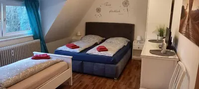 Ein Bett oder Betten in einem Zimmer der Unterkunft Ferienwohnung Resi