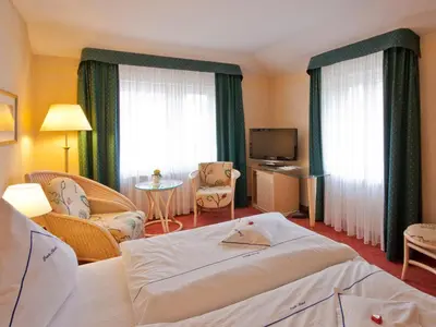 Ein Bett oder Betten in einem Zimmer der Unterkunft Park-Hotel