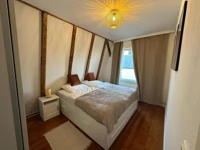Ein Bett oder Betten in einem Zimmer der Unterkunft Haus Newgate