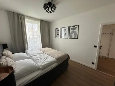 Ein Bett oder Betten in einem Zimmer der Unterkunft Haus Newgate