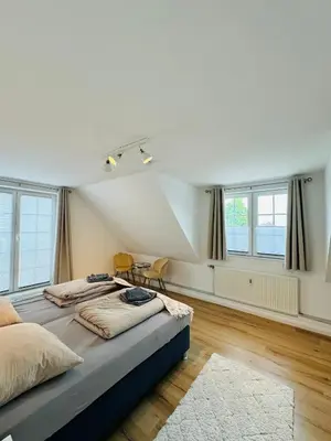 Ein Bett oder Betten in einem Zimmer der Unterkunft Traumhaftes Familiendomizil in Scharbeutz - Strand 500m, kostenlos Parken, Garten