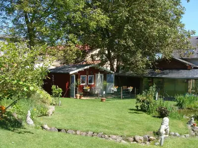 Ein Garten an der Unterkunft NEU! Anitas Ostseefewo Nähe Lübeck