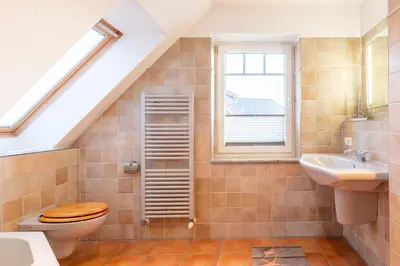 Ein Badezimmer in der Unterkunft Ferienhaus Strandmuschel