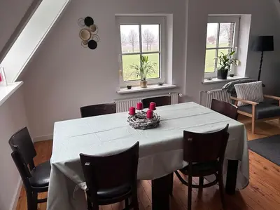 Ein Sitzbereich in der Unterkunft Ferienhaus am Poggensee