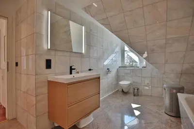 Ein Badezimmer in der Unterkunft Ferienappartement Strandallee 150a Appartement 3