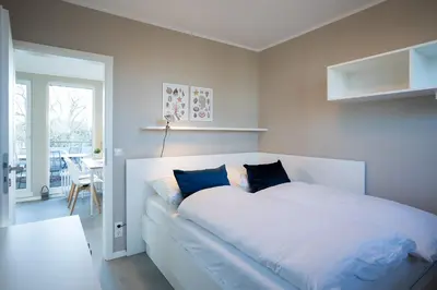 Ein Bett oder Betten in einem Zimmer der Unterkunft PAR1 Ferienwohnung Appartement 28