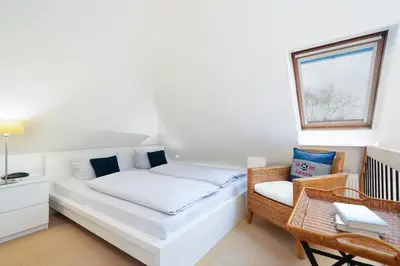 Ein Bett oder Betten in einem Zimmer der Unterkunft Haus am Kurpark App 11