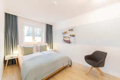 Ein Bett oder Betten in einem Zimmer der Unterkunft Ferienwohnung Urlaubsflair