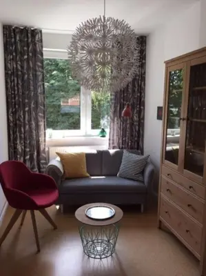 Ein Sitzbereich in der Unterkunft Appartement Siri - Strand- und Bahnhofsnah