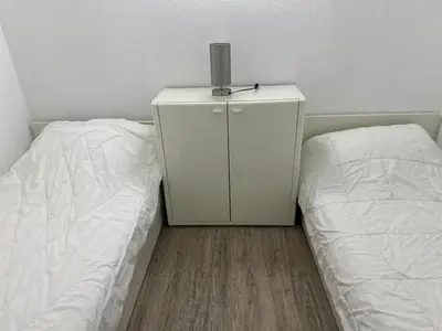 Ein Bett oder Betten in einem Zimmer der Unterkunft ButschisBude