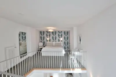 Ein Bett oder Betten in einem Zimmer der Unterkunft Haus Miramar Treffert Appartement 21