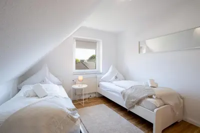 Ein Bett oder Betten in einem Zimmer der Unterkunft Ferienhaus Niwaki