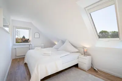 Ein Bett oder Betten in einem Zimmer der Unterkunft Ferienhaus Niwaki