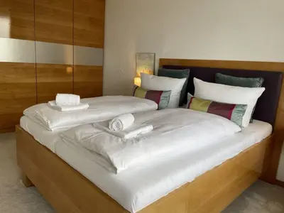 Ein Bett oder Betten in einem Zimmer der Unterkunft Meeresrauschen 2-Zimmer-Meerblick-Appartement