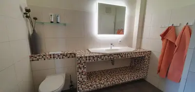 Ein Badezimmer in der Unterkunft Bei Schroeter's