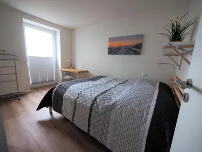 Ein Bett oder Betten in einem Zimmer der Unterkunft FIS 001 - Seeperle