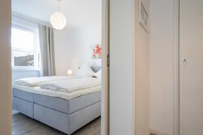 Ein Bett oder Betten in einem Zimmer der Unterkunft Kie 009