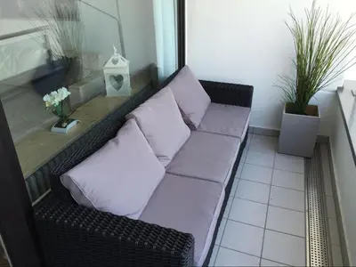 Ein Sitzbereich in der Unterkunft H5 20 - Hanseat - Außenschwimmbad