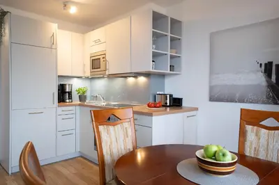 Küche/Küchenzeile in der Unterkunft TER 215 - Terrassenhuegel - Seeblick