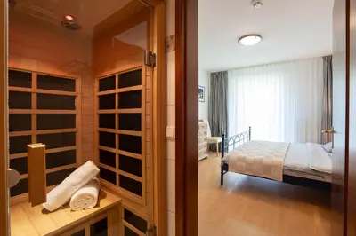 Ein Bett oder Betten in einem Zimmer der Unterkunft AKH 044 - Wellness in Haffkrug