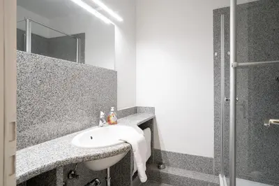 Ein Badezimmer in der Unterkunft HOF 210 - Berliner Hof - Seeblick
