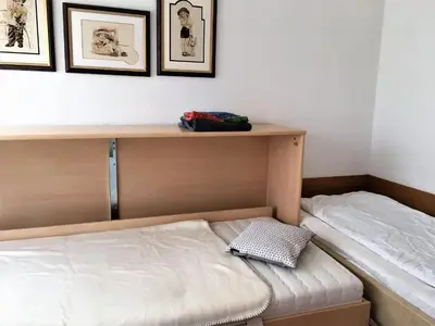 Ein Bett oder Betten in einem Zimmer der Unterkunft RES 401 - Residenz - Seeblick