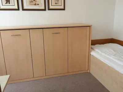 Ein Bett oder Betten in einem Zimmer der Unterkunft RES 401 - Residenz - Seeblick