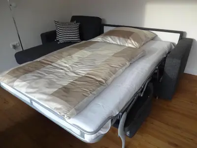 Ein Bett oder Betten in einem Zimmer der Unterkunft TER 101 - Terrassenhuegel -Teilseeblick