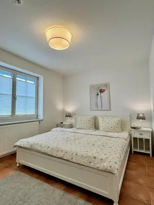 Ein Bett oder Betten in einem Zimmer der Unterkunft FIS 501 - Hanseaten Residenz
