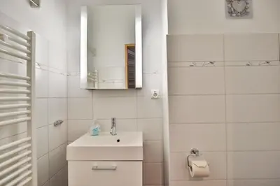 Ein Badezimmer in der Unterkunft Am Kardohr 5, Appartement Meerhauch
