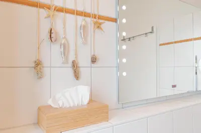Ein Badezimmer in der Unterkunft Ferienwohnung Lille Sand 2