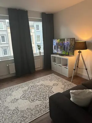 Ein Bett oder Betten in einem Zimmer der Unterkunft Ferienwohnung Hansetraum Lübeck