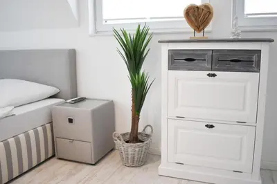 Ein Bett oder Betten in einem Zimmer der Unterkunft Sealect-Hus 4 Timmendorfer Strand, mit Sauna